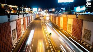 Underpass Simpang Dewa Ruci di Kuta Bali dengan patung Dewa Ruci menjulang di atas simpang jalan.